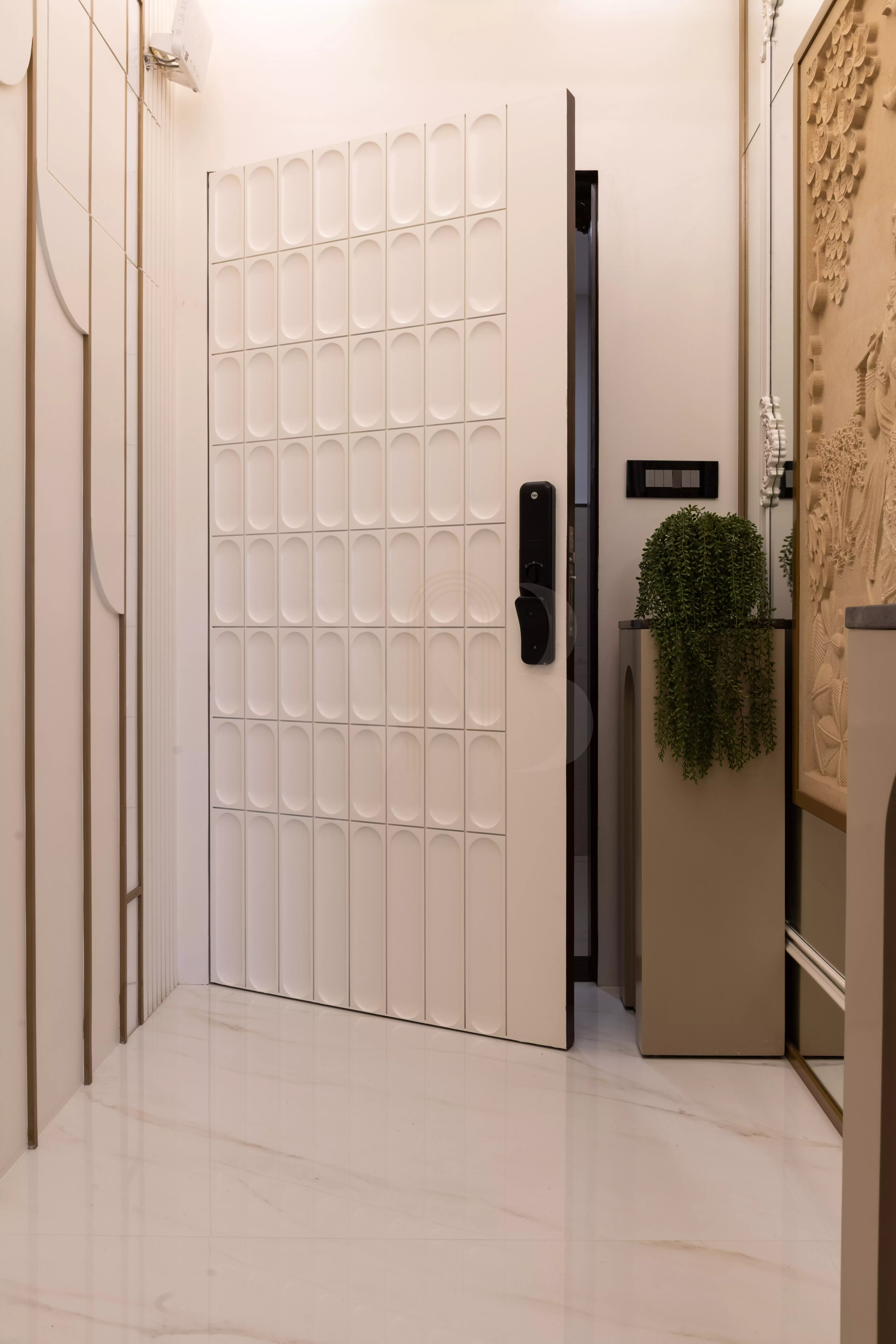 Textured entrance wall paneling design