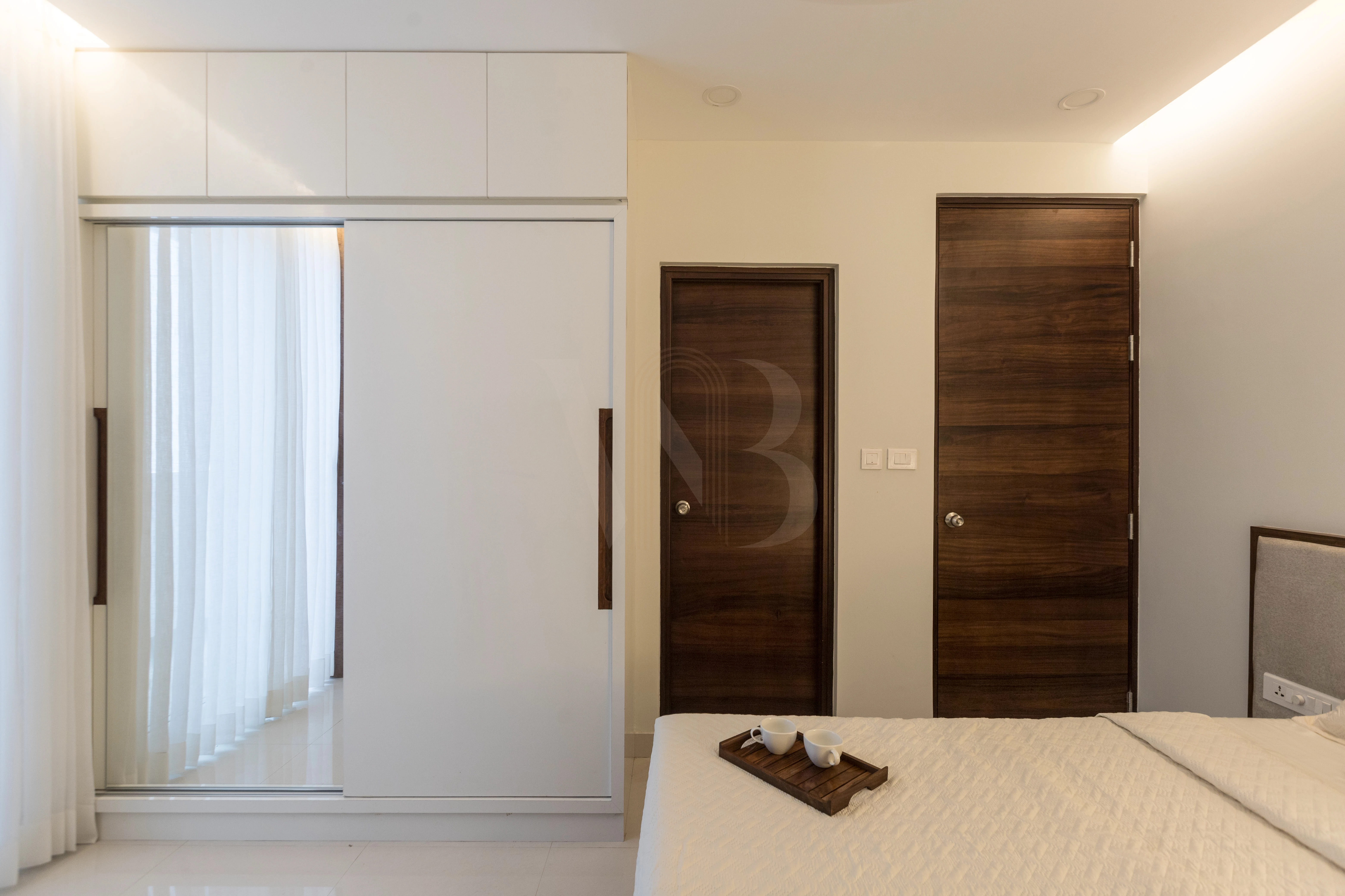 Guest room layout and clean ambient lighting